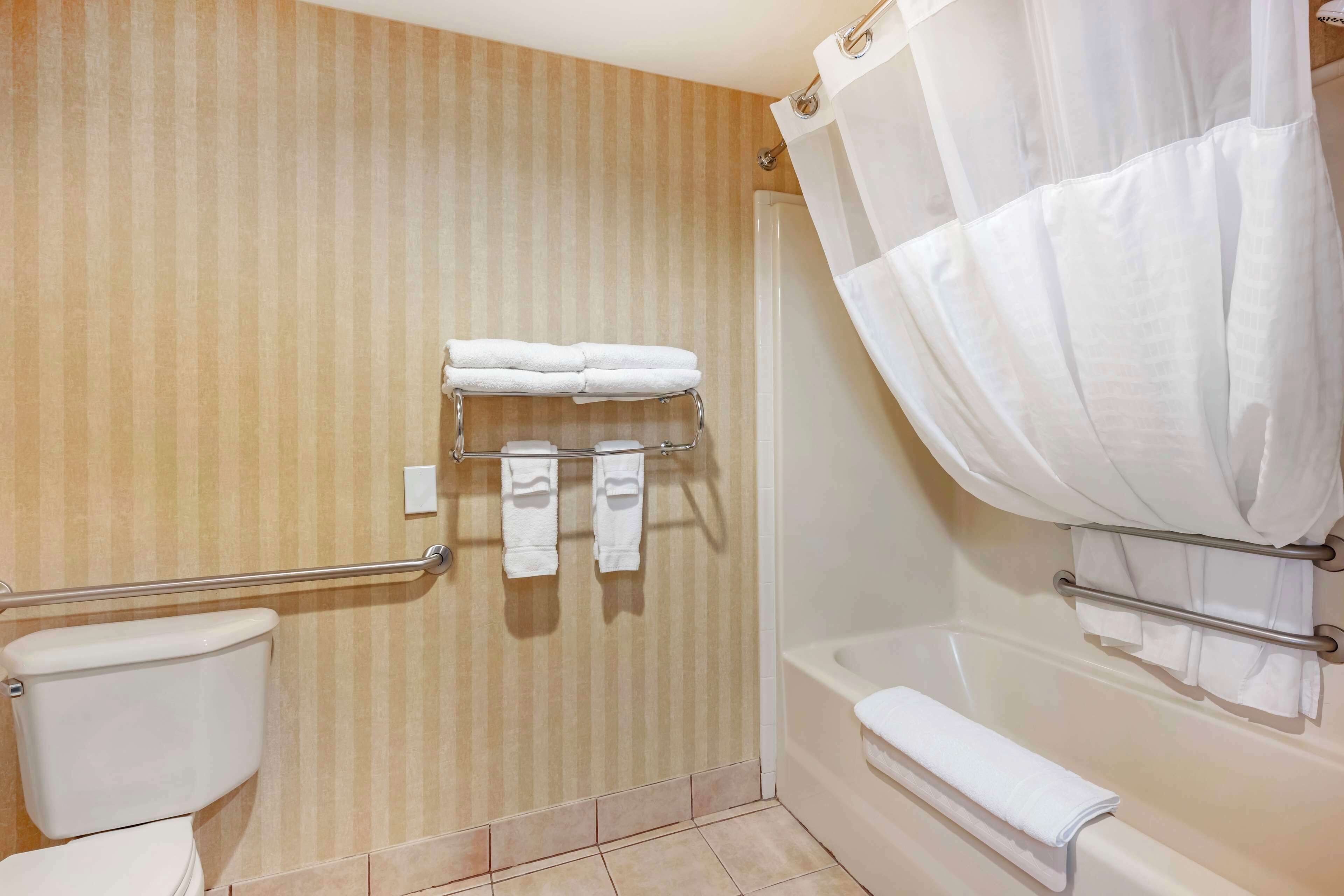combined shower/bathtub, free toiletries, hair dryer, towels