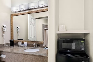 Separate bathtub and shower, hair dryer, towels