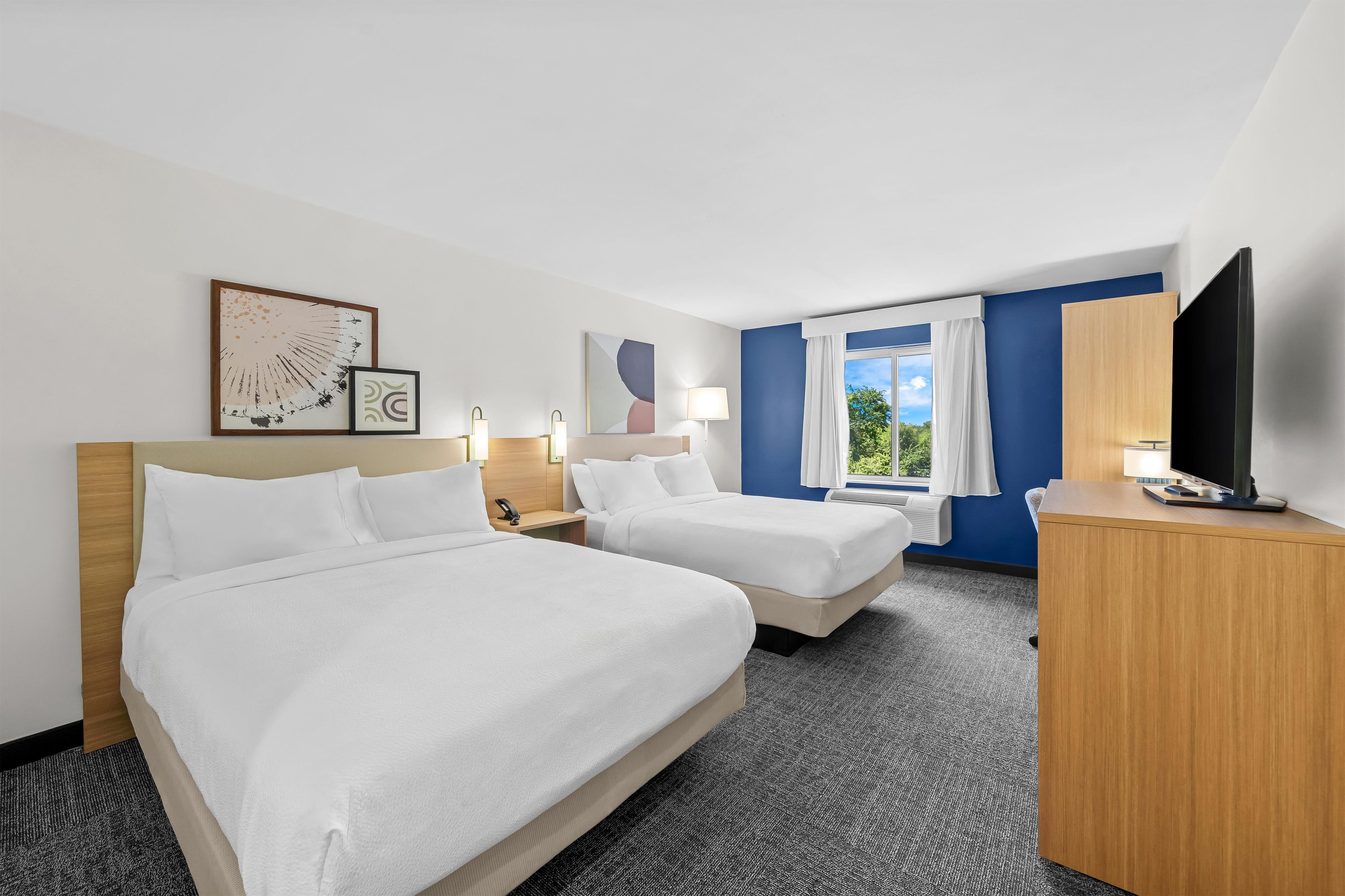 Pillowtop beds, desk, laptop workspace, blackout drapes
