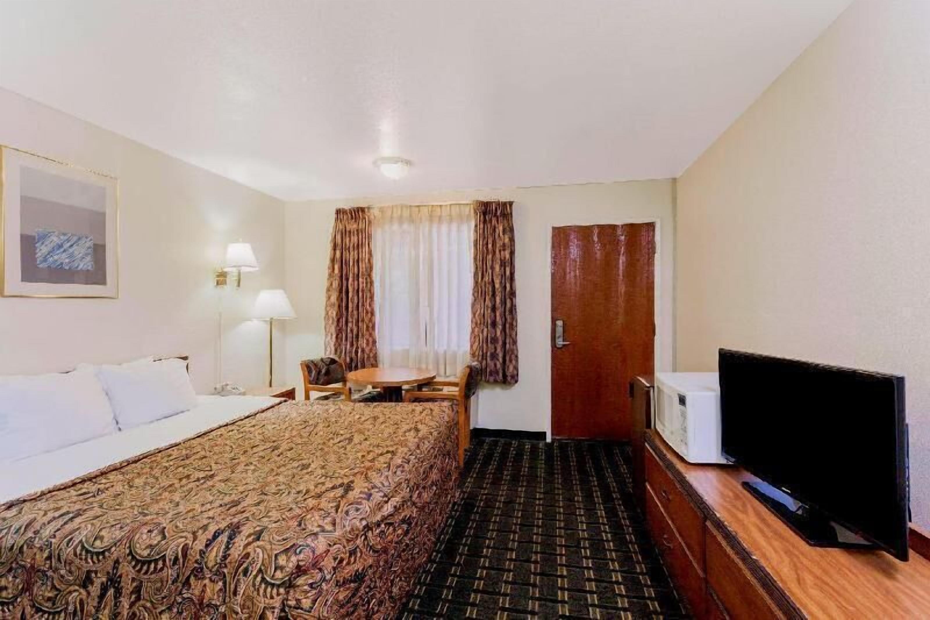 Down comforters, pillowtop beds, desk, laptop workspace