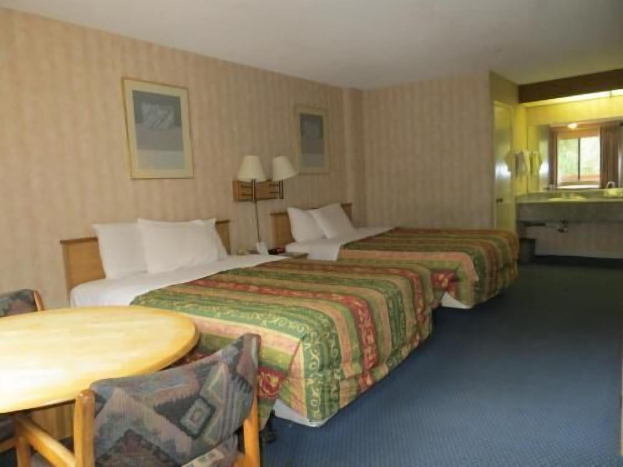 Down comforters, pillowtop beds, desk, laptop workspace