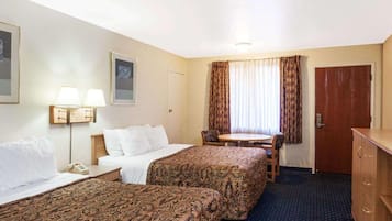 Down comforters, pillowtop beds, desk, laptop workspace