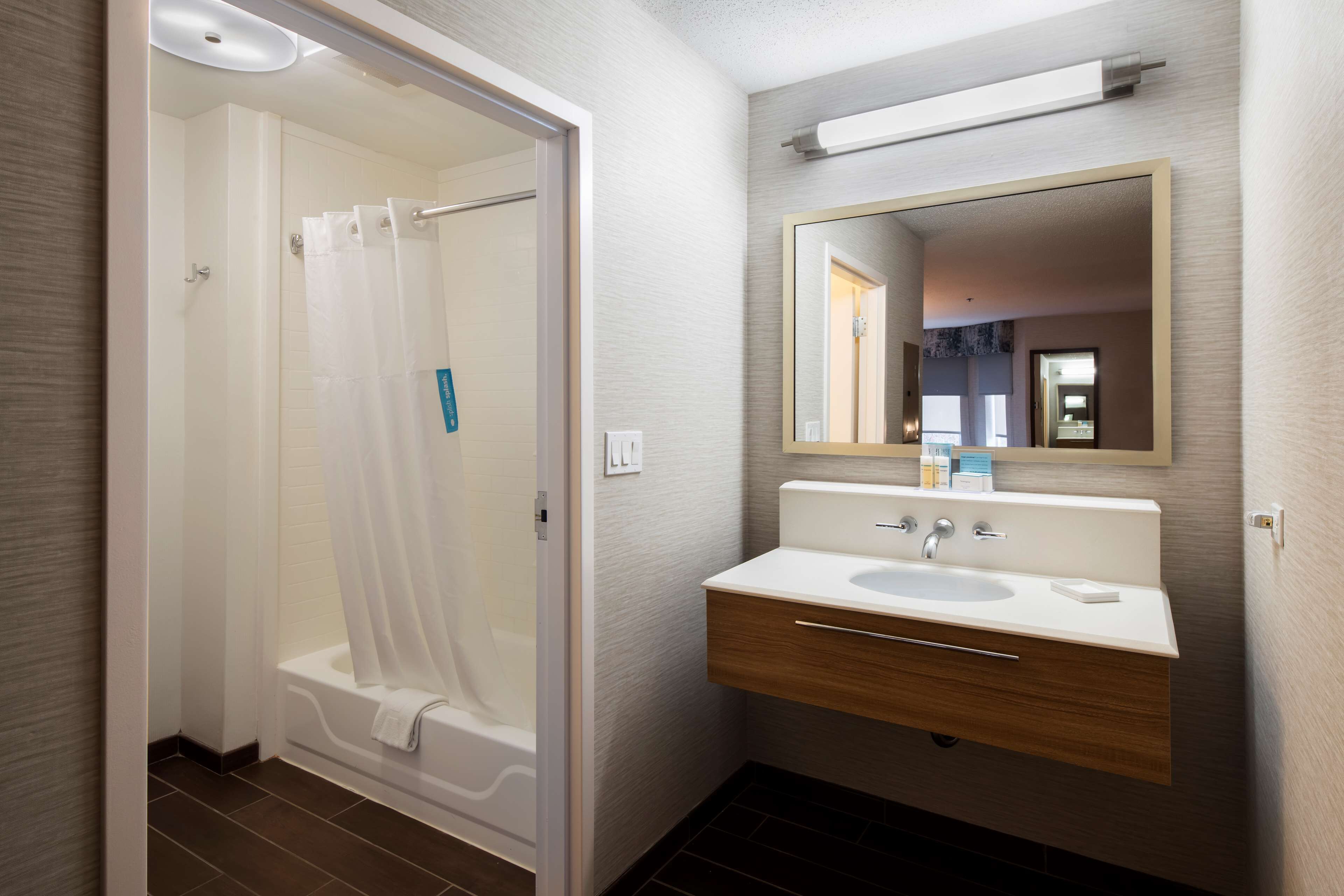 suite, 2 queen beds | bathroom | shower, free toiletries, hair dryer, towels
