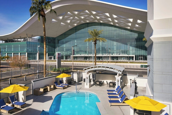 Outdoor pool, open 7:00 AM to 11:00 PM, sun loungers