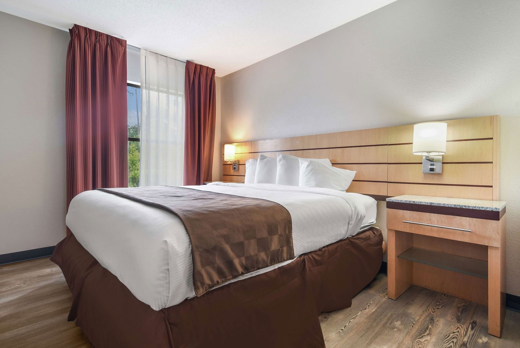 Laptop workspace, blackout drapes, iron/ironing board, cribs/infant beds