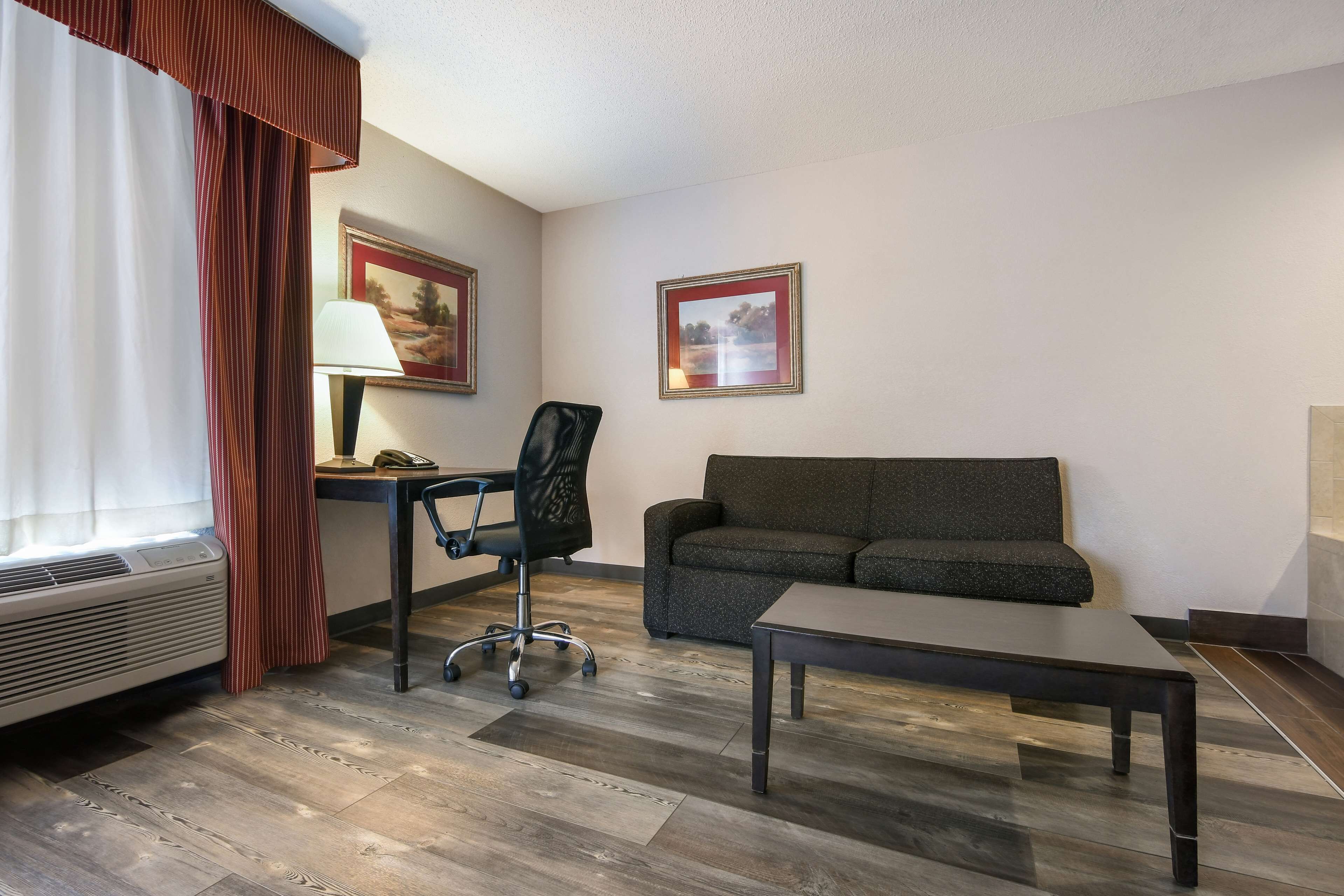 Laptop workspace, blackout drapes, iron/ironing board, cribs/infant beds