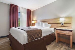 Laptop workspace, blackout curtains, iron/ironing board - SureStay Plus Hotel by Best Western Tarboro (Tarboro)