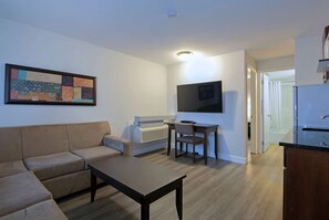 Suite, 1 Queen Bed, Non Smoking | Pillowtop beds, individually furnished, desk, soundproofing