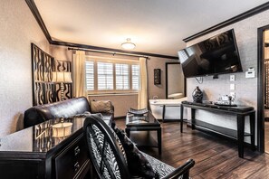 Suite, 1 King Bed, Non Smoking, Balcony | 1 bedroom, in-room safe, iron/ironing board, cribs/infant beds