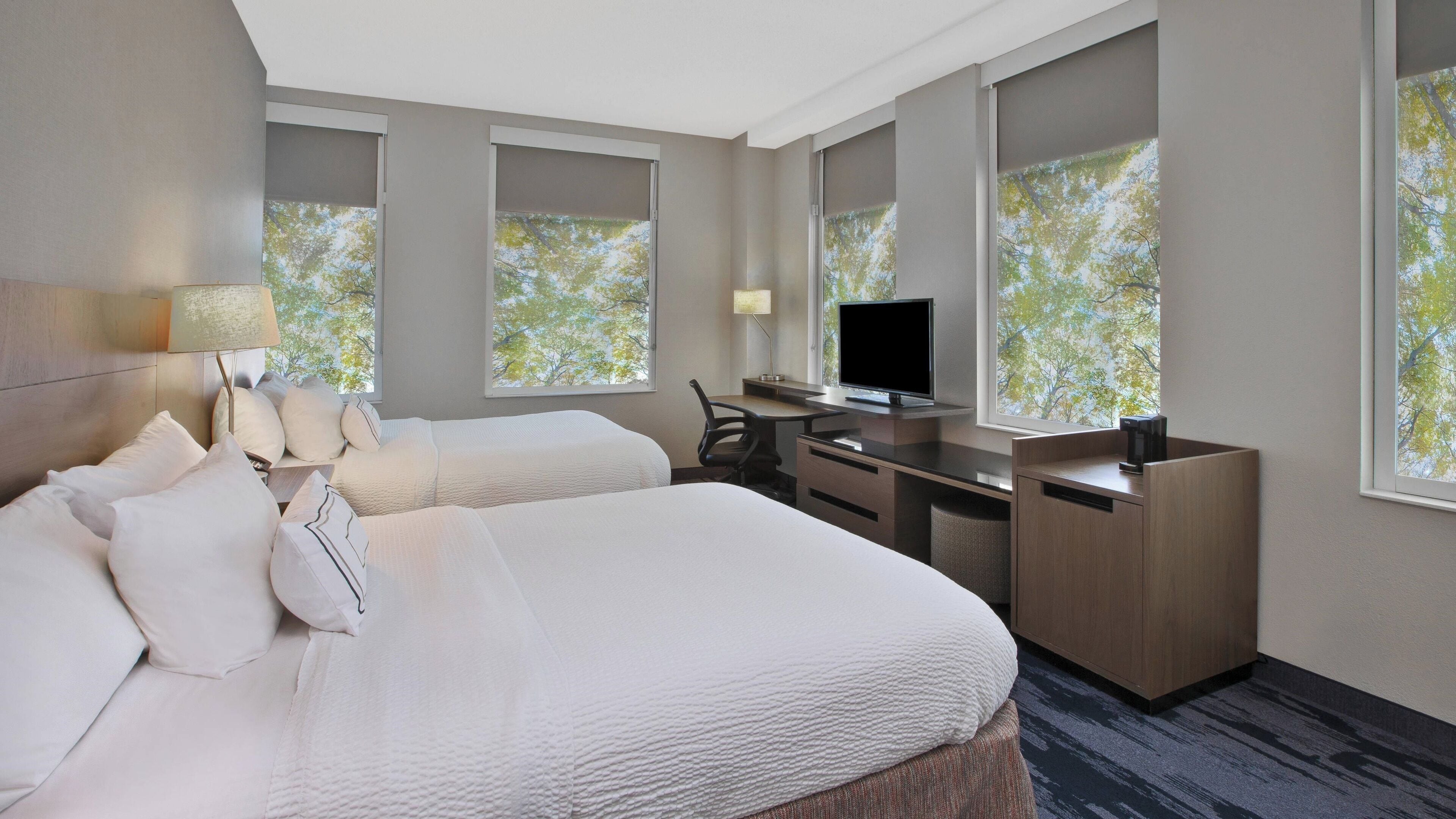 hypo-allergenic bedding, pillow-top beds, in-room safe, desk