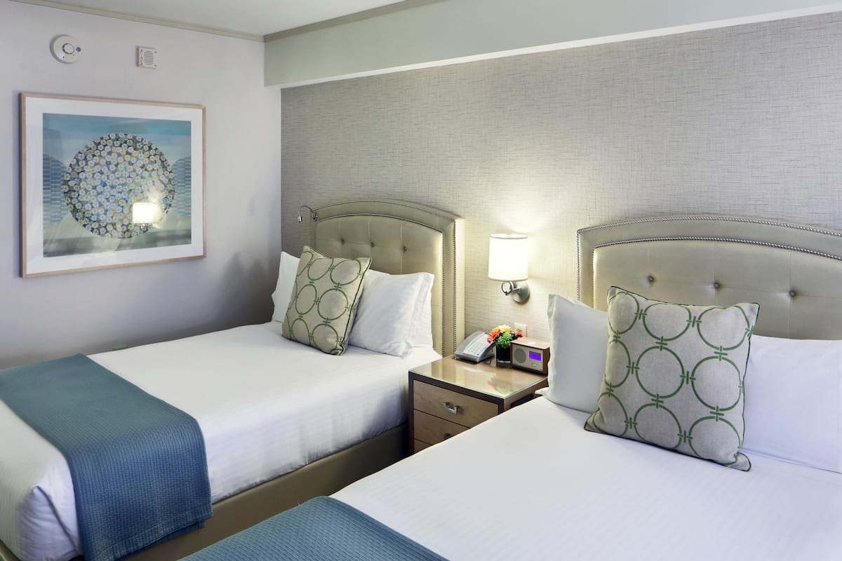 deluxe room, 2 double beds | hypo-allergenic bedding, pillow-top beds, in-room safe, desk