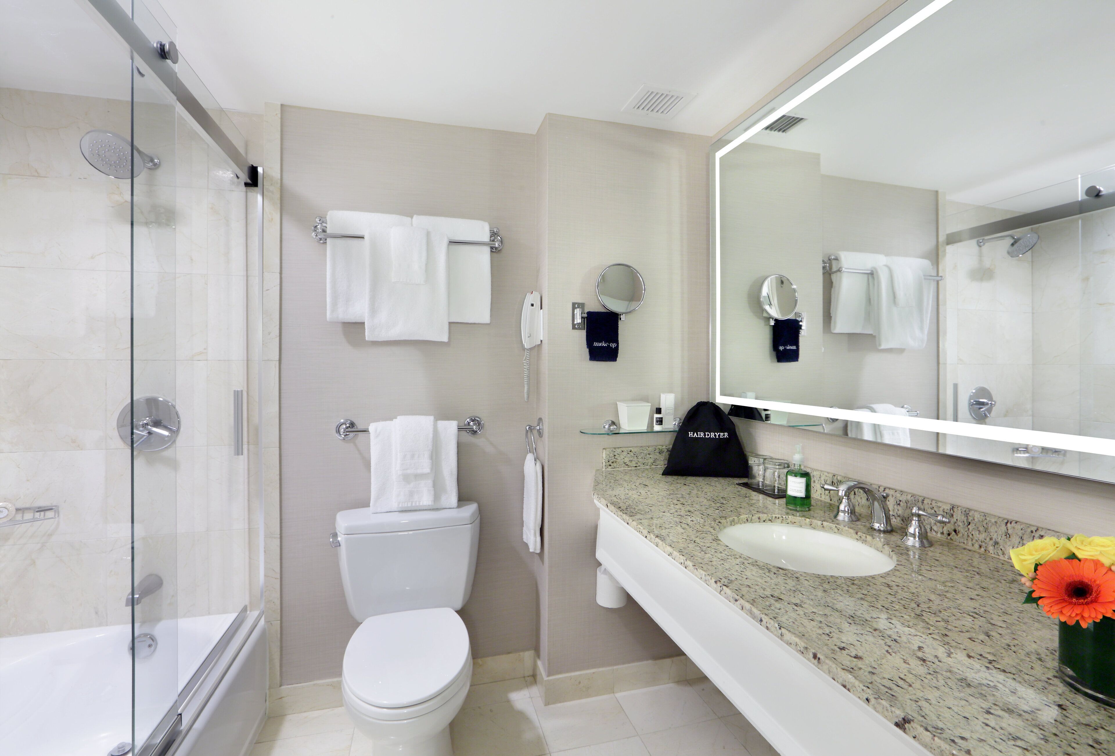 eco-friendly toiletries, hair dryer, bathrobes, towels