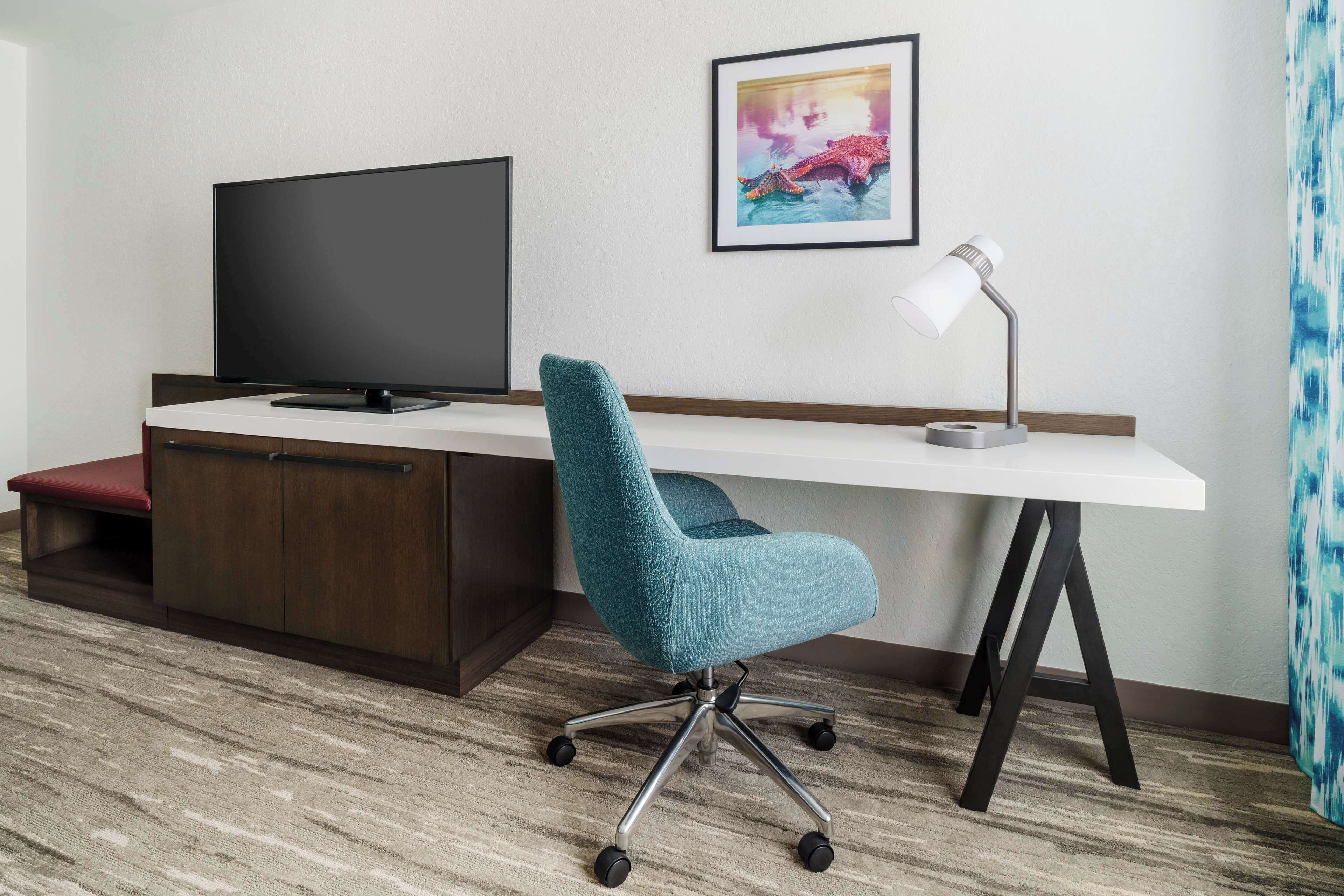 desk, blackout curtains, iron/ironing board, free cots/infant beds