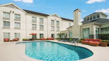 Outdoor pool, open 7:00 AM to 10:00 PM, pool umbrellas, sun loungers