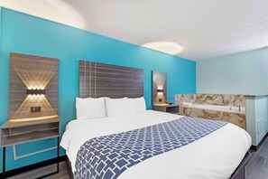 Suite, 1 King Bed, Non Smoking | In-room safe, desk, soundproofing, iron/ironing board