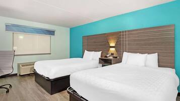 Standard Room, 2 Queen Beds, Non Smoking | In-room safe, desk, soundproofing, iron/ironing board