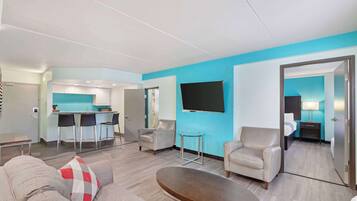 Suite, 1 King Bed, Non Smoking | In-room safe, desk, soundproofing, iron/ironing board