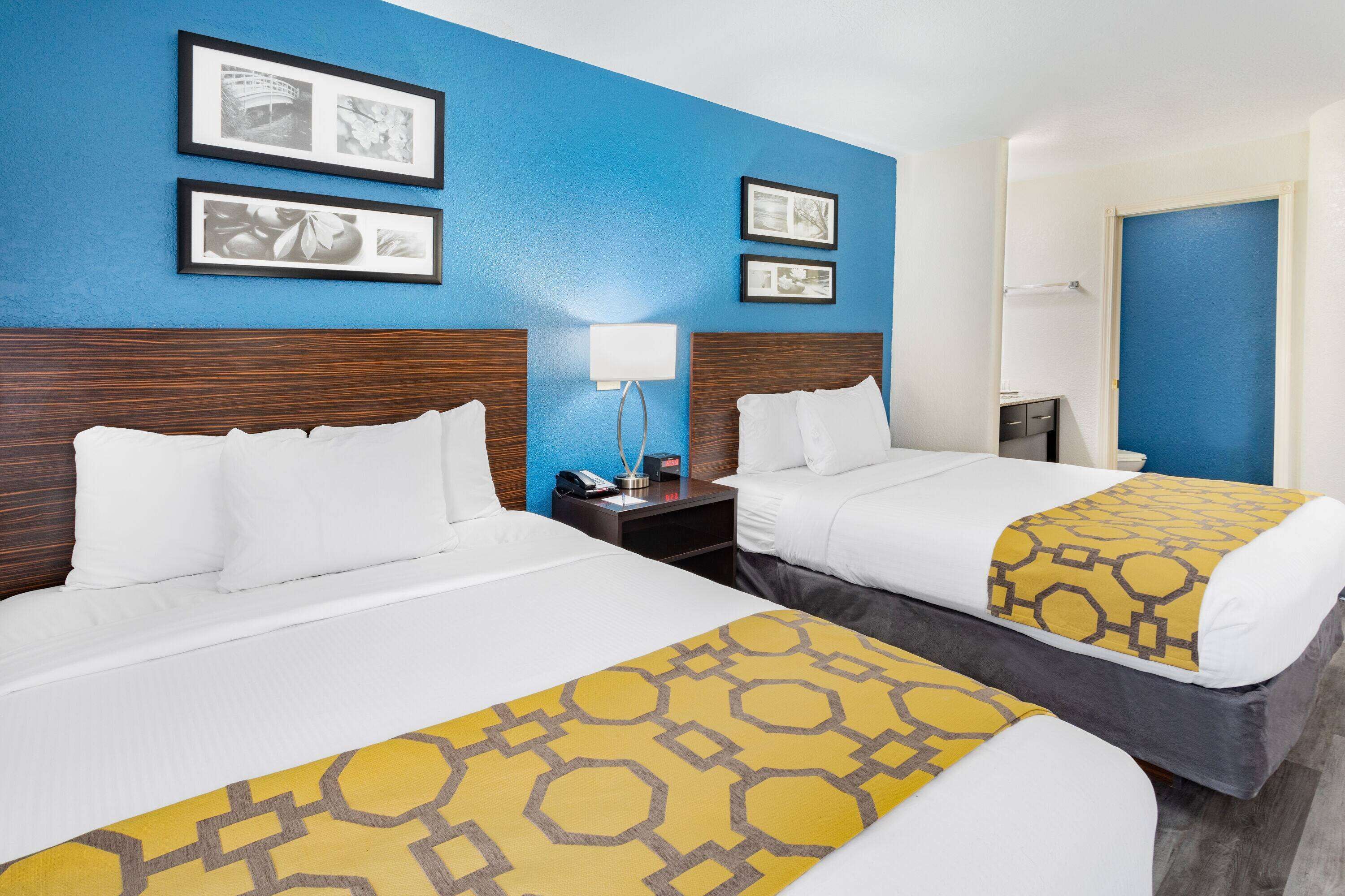 room, 2 queen beds, non smoking | desk, iron/ironing board, rollaway beds, free wifi