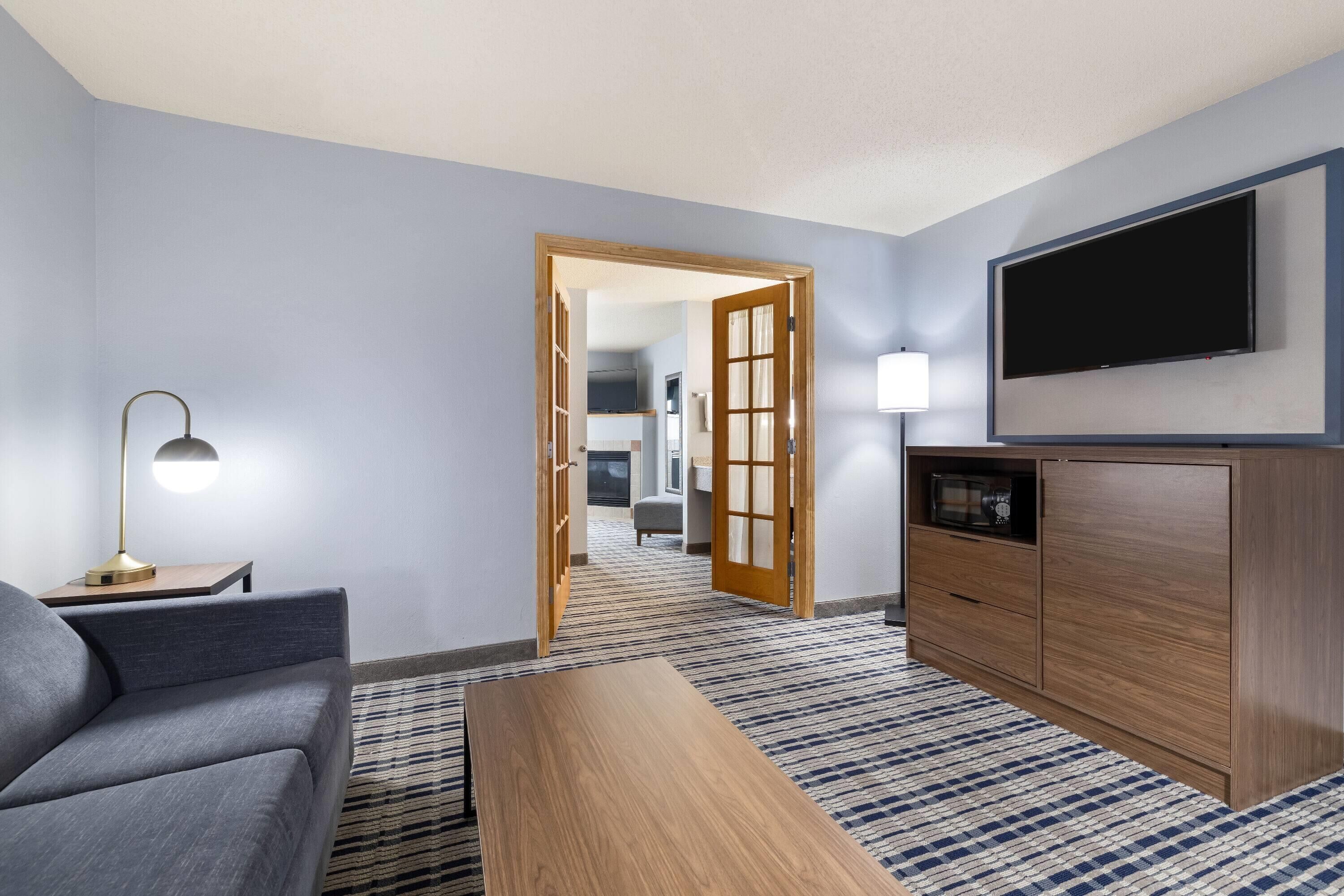 Suite, 2 Queen Beds, Non Smoking (One-Bedroom Not Pet Friendly) | Desk, iron/ironing board, travel crib, free WiFi