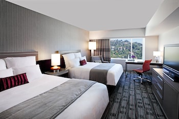 Premium bedding, pillowtop beds, minibar, in-room safe at Loews Hollywood Hotel
