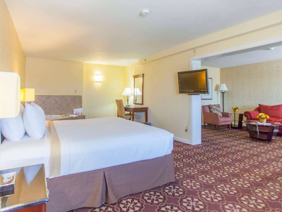 Suíte estúdio luxo, 1 cama King, para não fumantes | Escrivaninha, ferros/tábuas de passar roupa, berços grátis