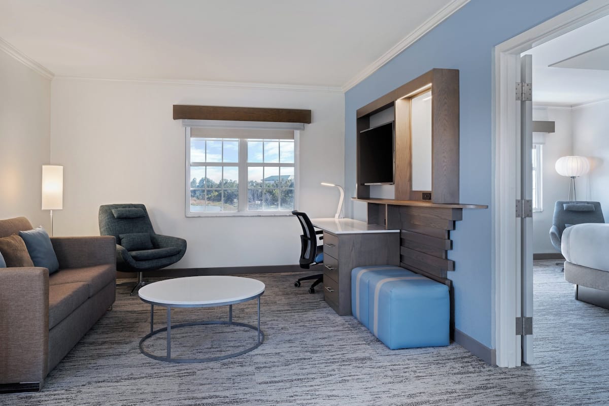 Premium bedding, blackout drapes, iron/ironing board