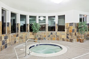 Indoor pool, open 6:00 AM to 11:00 PM, pool loungers