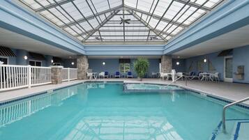 Indoor pool, open 10:00 AM to 11:00 PM, pool loungers