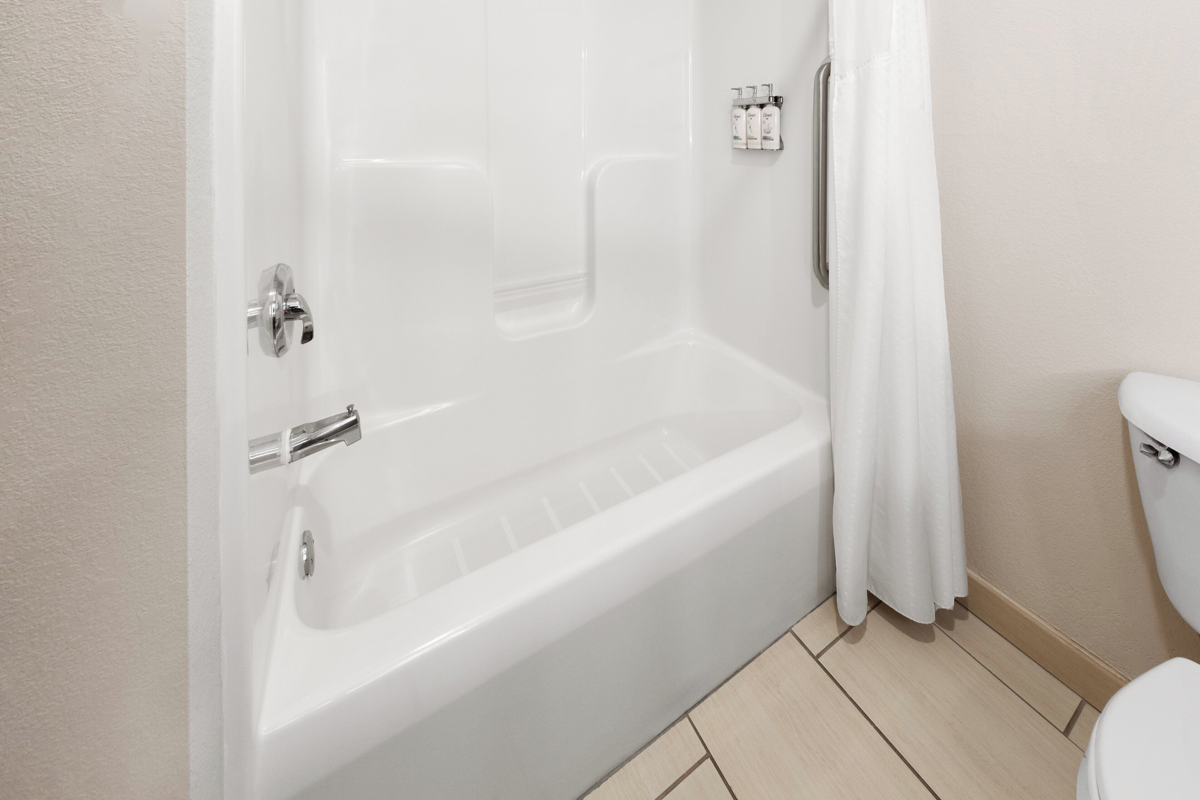 combined shower/bathtub, free toiletries, hair dryer, towels