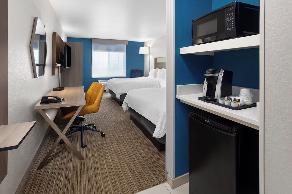 standard room, 2 queen beds | 1 bedroom, in-room safe, blackout curtains, iron/ironing board