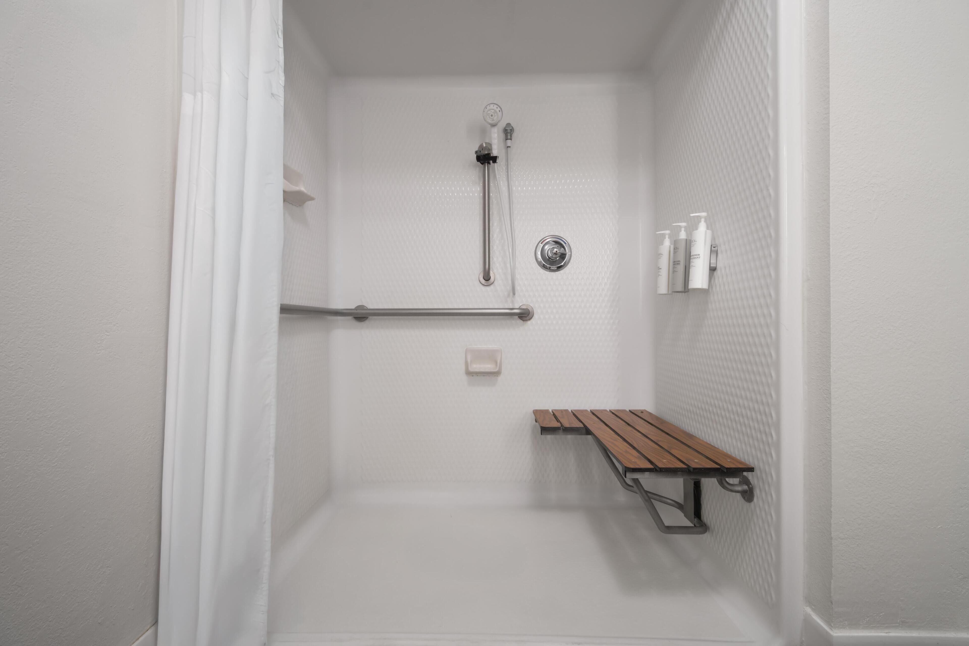 A shower stall with a handheld showerhead, a handheld shower control, a handheld shower hose, a handheld shower control, a handheld shower hose, a handheld shower control, a handheld shower hose, a handheld shower control, a handheld shower hose, a handheld shower control, a handheld shower hose, a handheld shower control, a handheld shower hose, a handheld shower control, a handheld shower hose, a handheld shower control, a handheld shower hose, a handheld shower control, a handheld shower hose, a handheld shower control, a handheld shower hose, a handheld shower control, a handheld shower hose, a handheld shower control, a handheld shower hose, a handheld shower control, a handheld shower hose, a handheld shower control, a handheld shower hose, a handheld shower control, a handheld shower hose, a handheld shower control, a handheld shower hose, a handheld shower control, a handheld shower hose, a handheld shower control, a handheld shower hose, a handheld shower control, a handheld shower