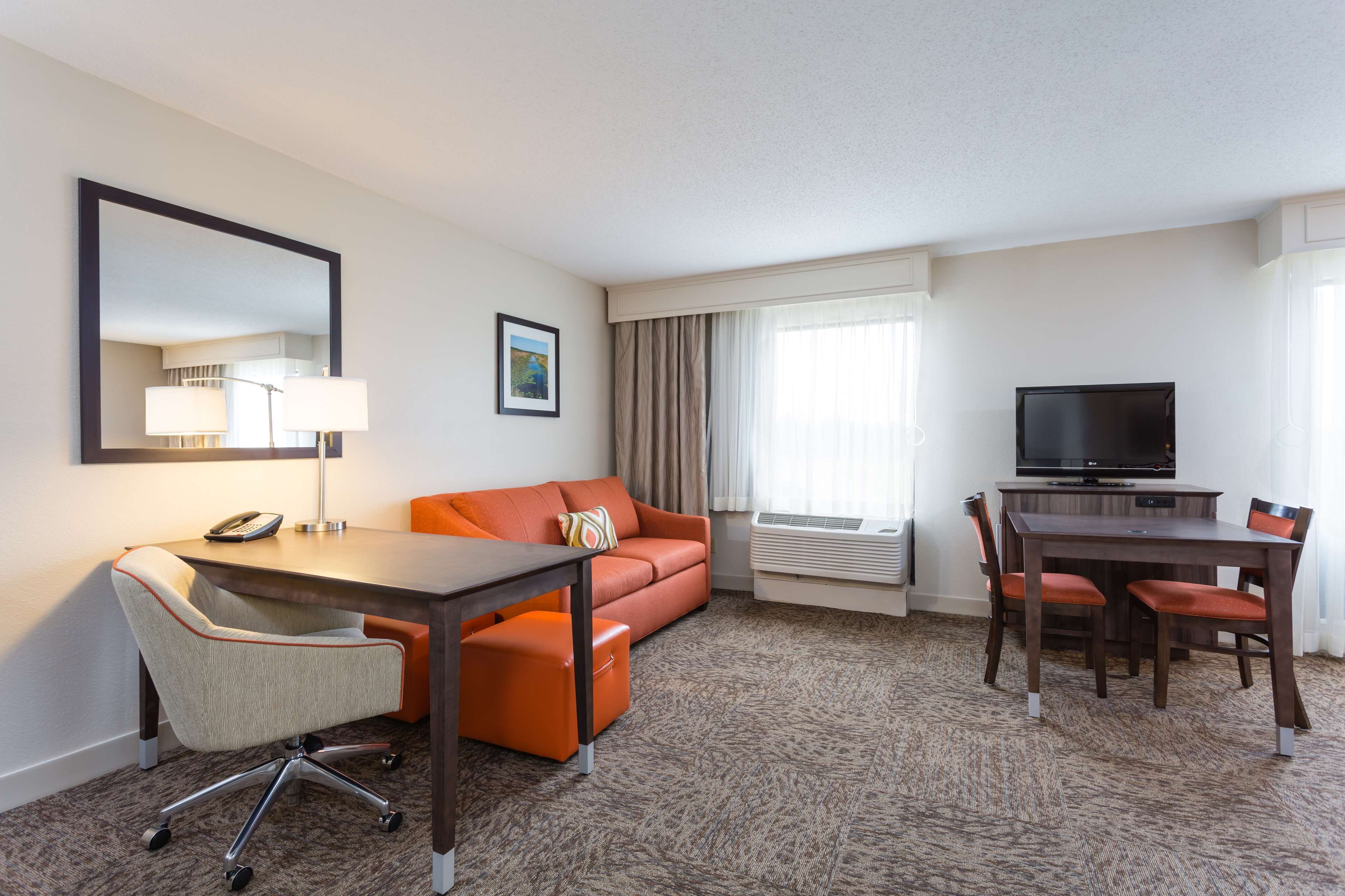 studio, 1 king bed, accessible, bathtub | living area | 32-inch lcd tv with satellite channels, tv