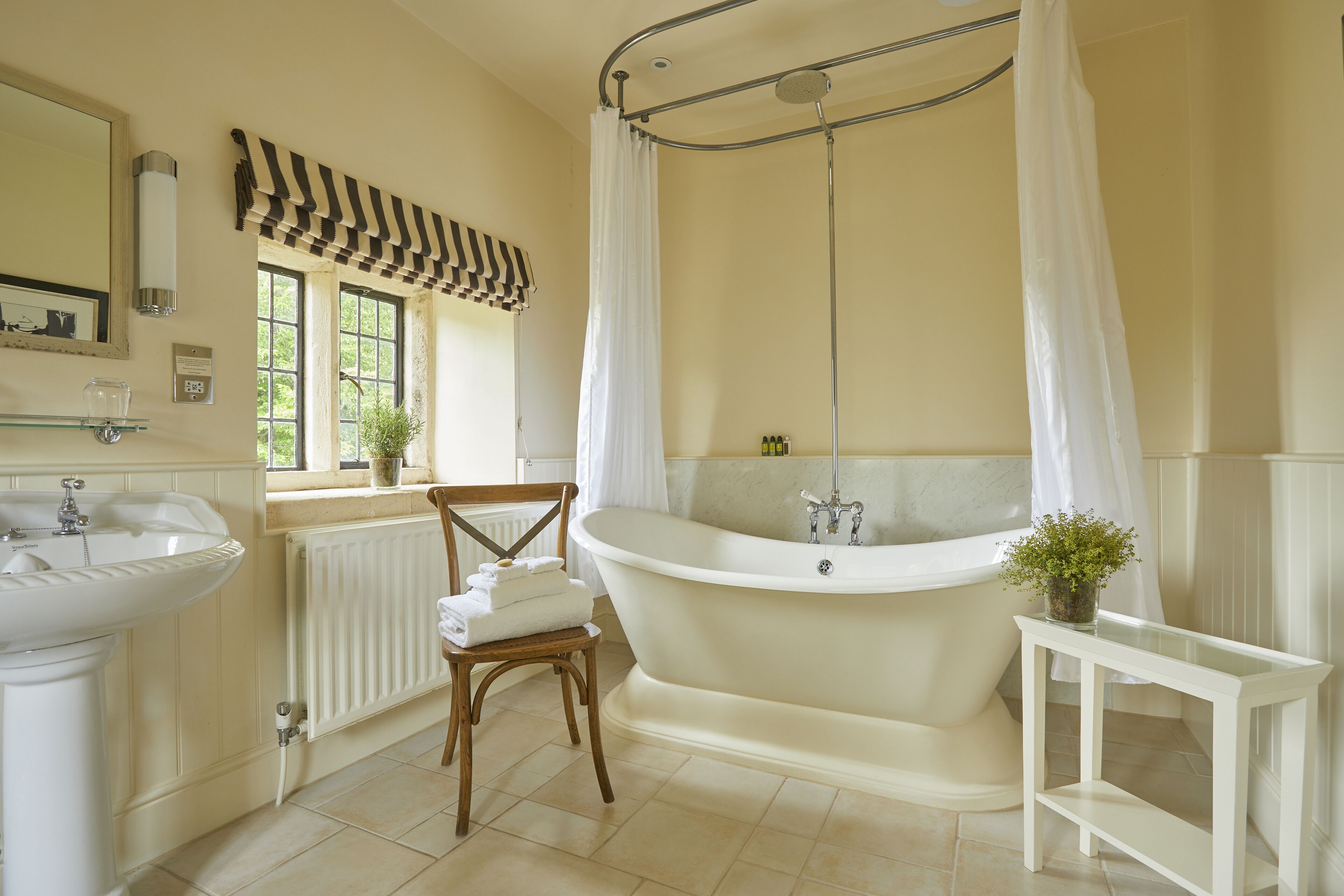 suite | bathroom | designer toiletries, hair dryer, bathrobes, slippers