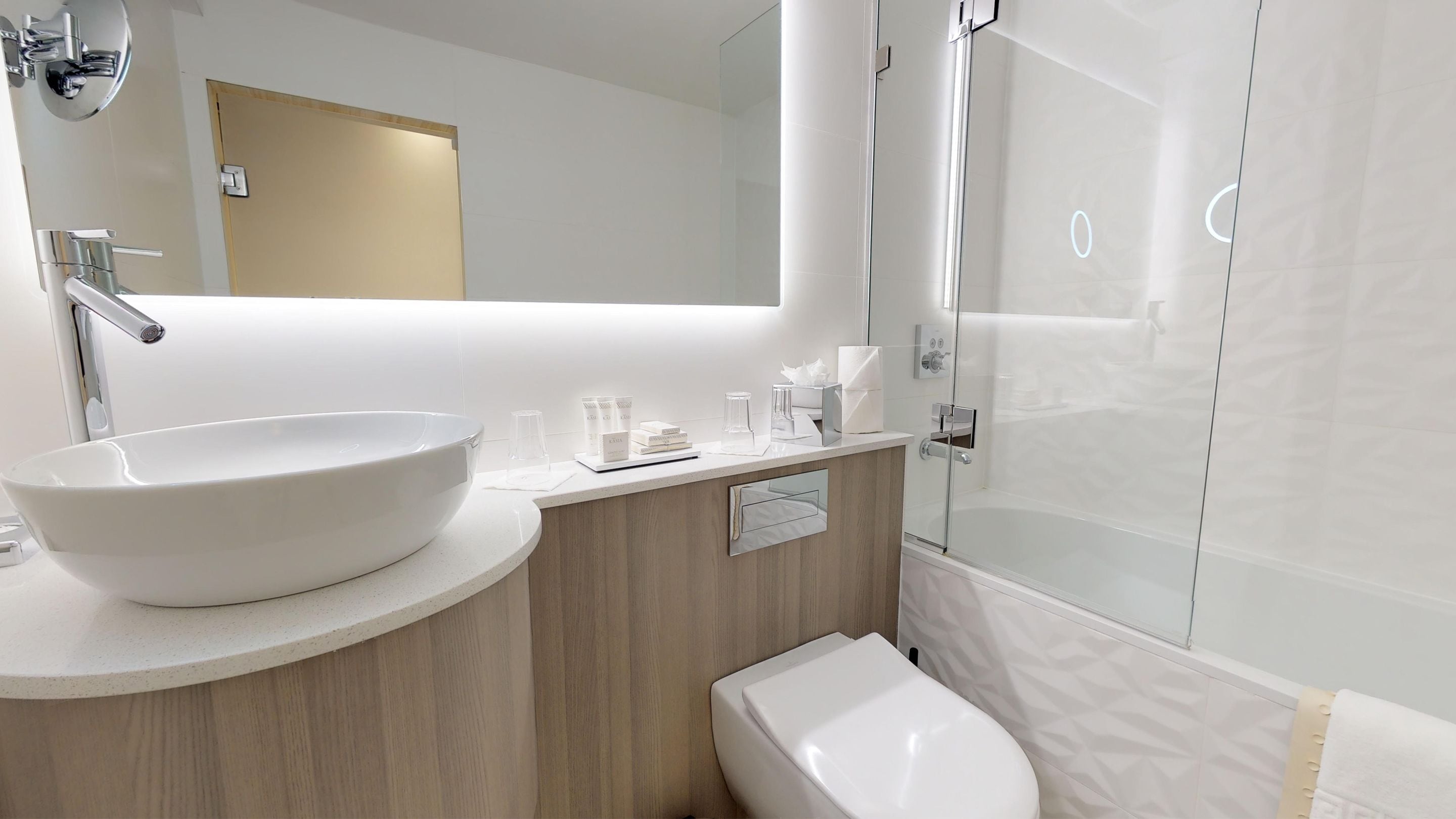 deluxe double room | bathroom | designer toiletries, hair dryer, slippers, towels