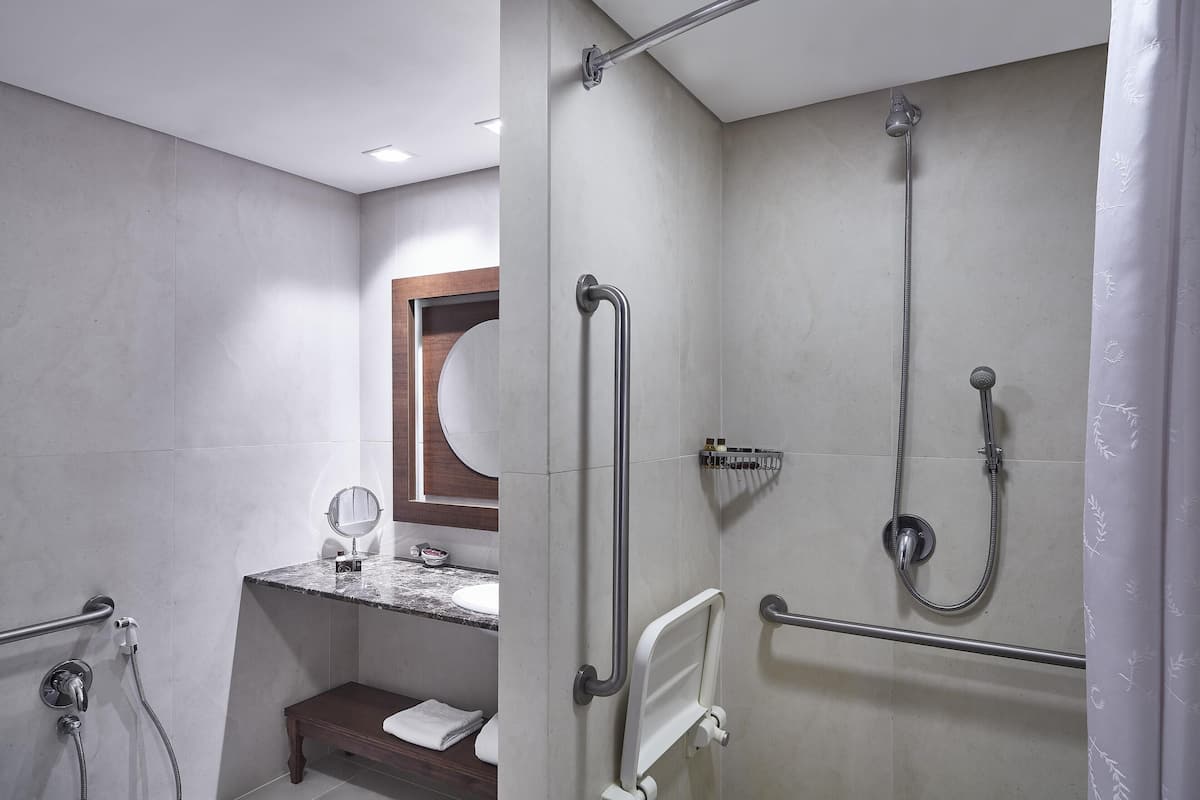 Superior Room, 1 King Bed, Accessible (Roll-In Shower) | Bathroom shower