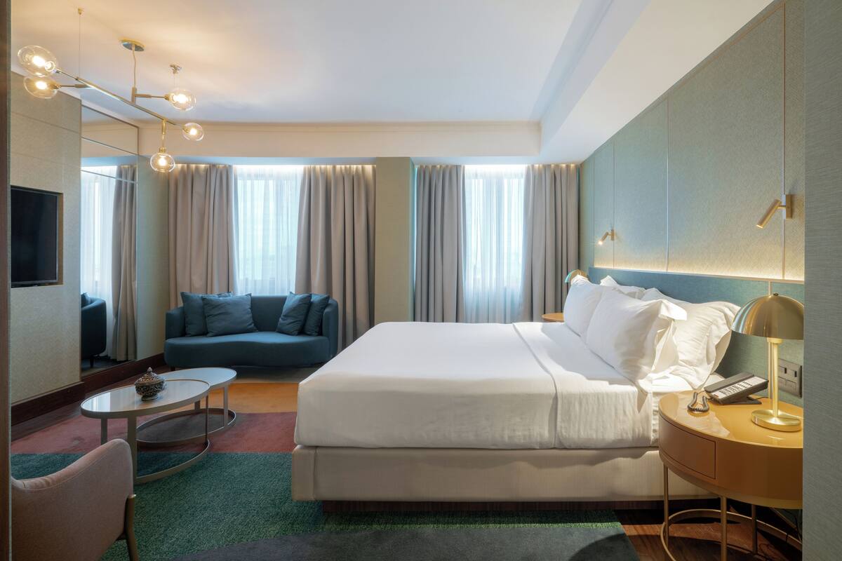 Suite presidencial, 1 dormitori | Minibar, caixa forta a l'habitació i escriptori