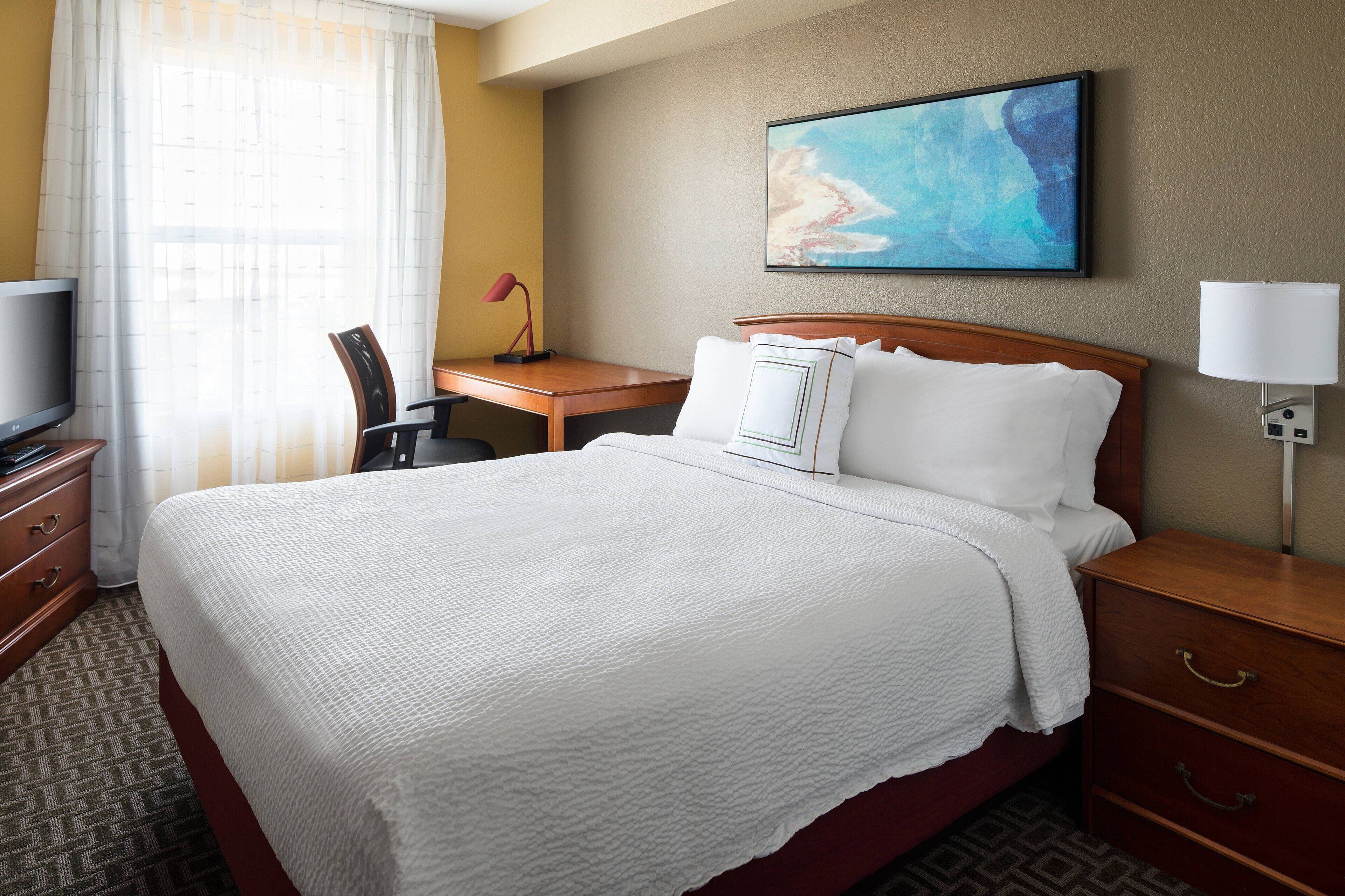 Down comforters, desk, laptop workspace, iron/ironing board