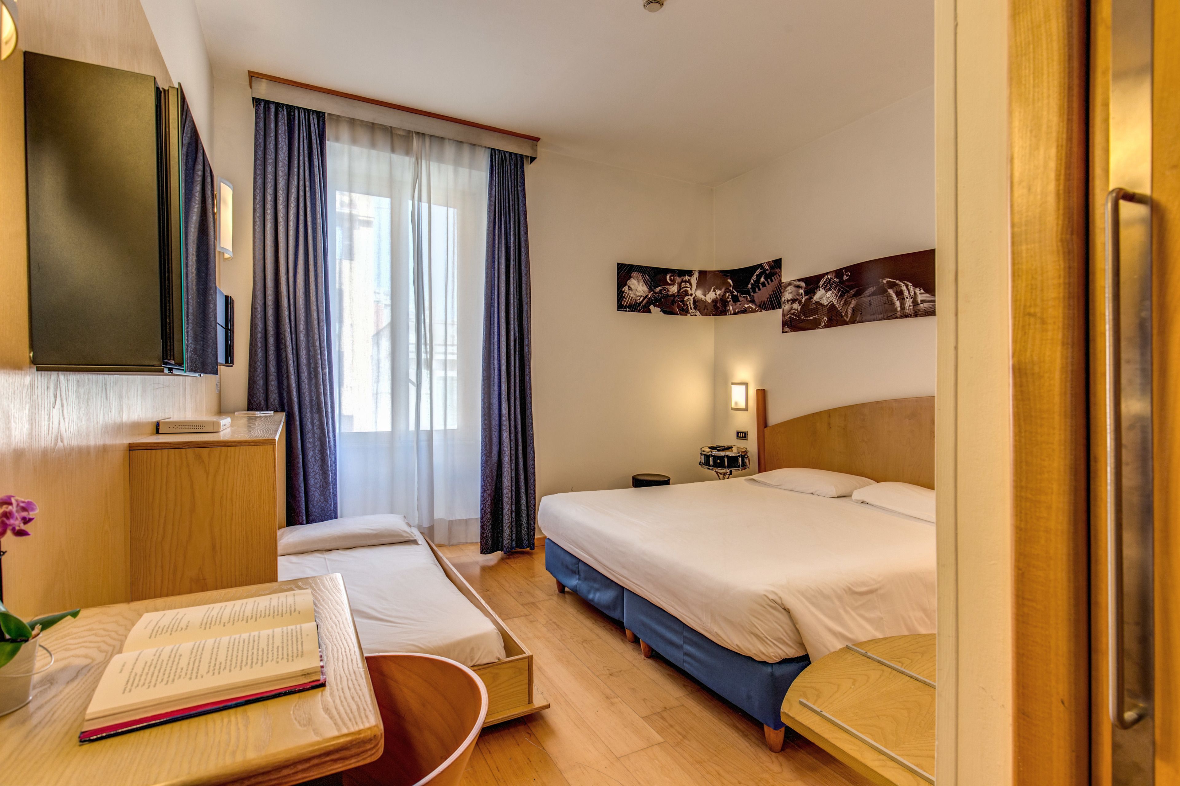 standard triple room, multiple beds | 1 bedroom, in-room safe, desk, blackout curtains