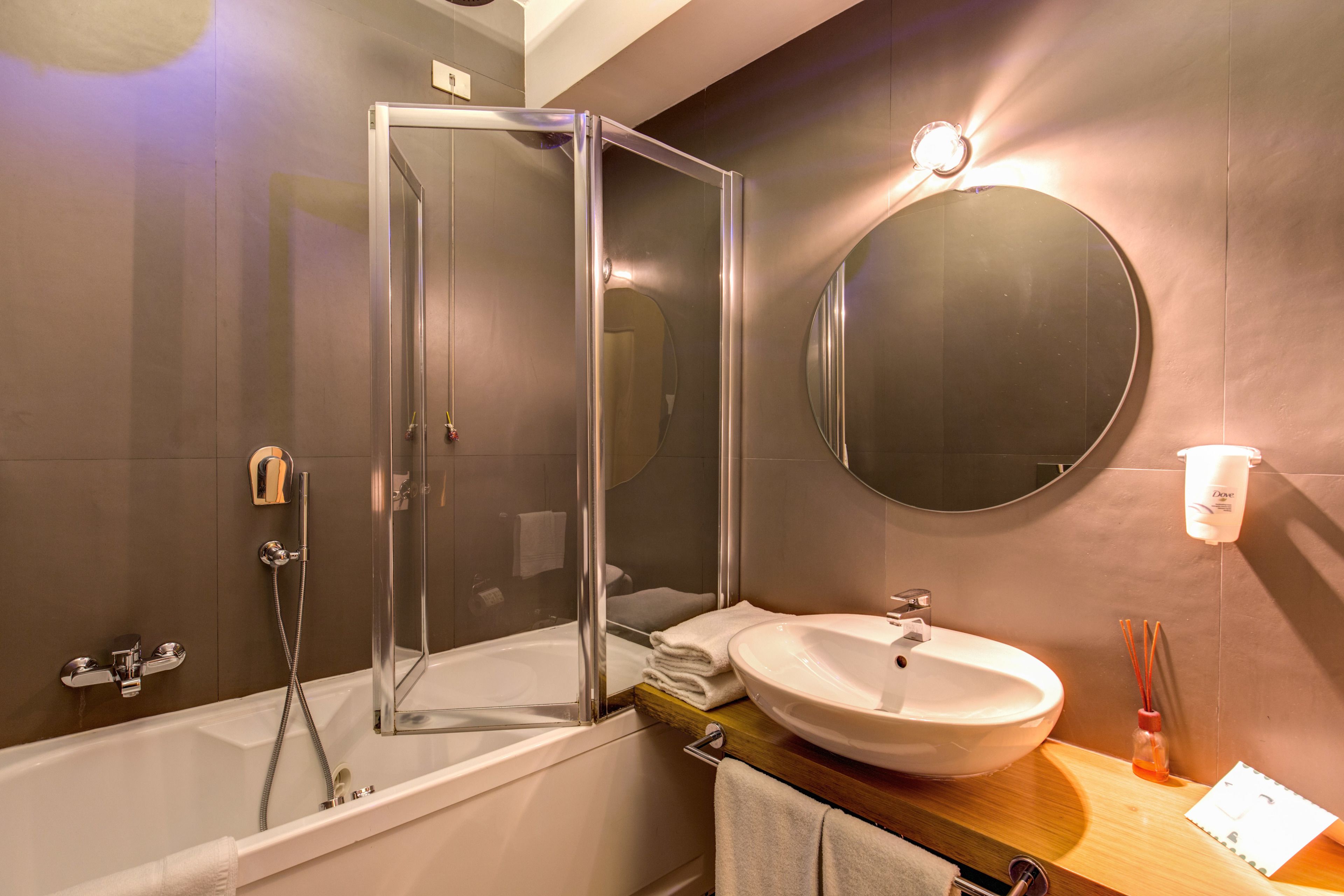 family room, 1 queen bed with sofa bed | bathroom | shower, free toiletries, hair dryer, bidet