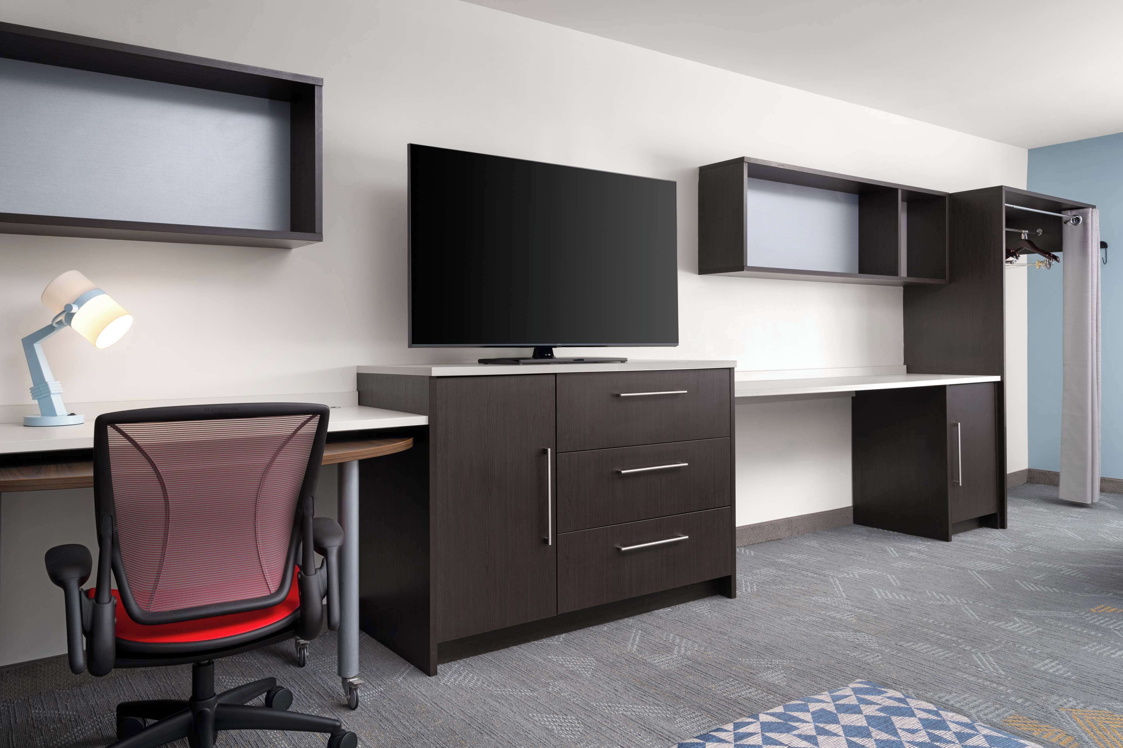 premium bedding, desk, laptop workspace, blackout curtains