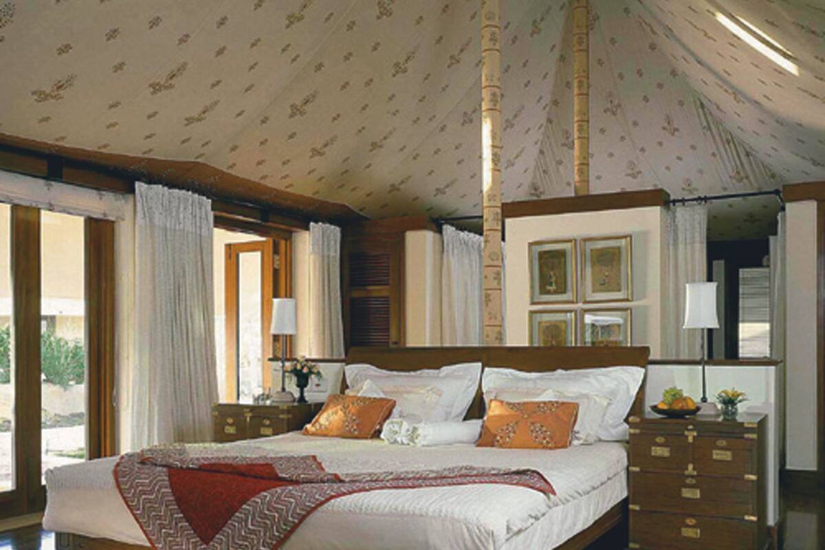 luxury tent | egyptian cotton sheets, premium bedding, memory-foam beds, minibar