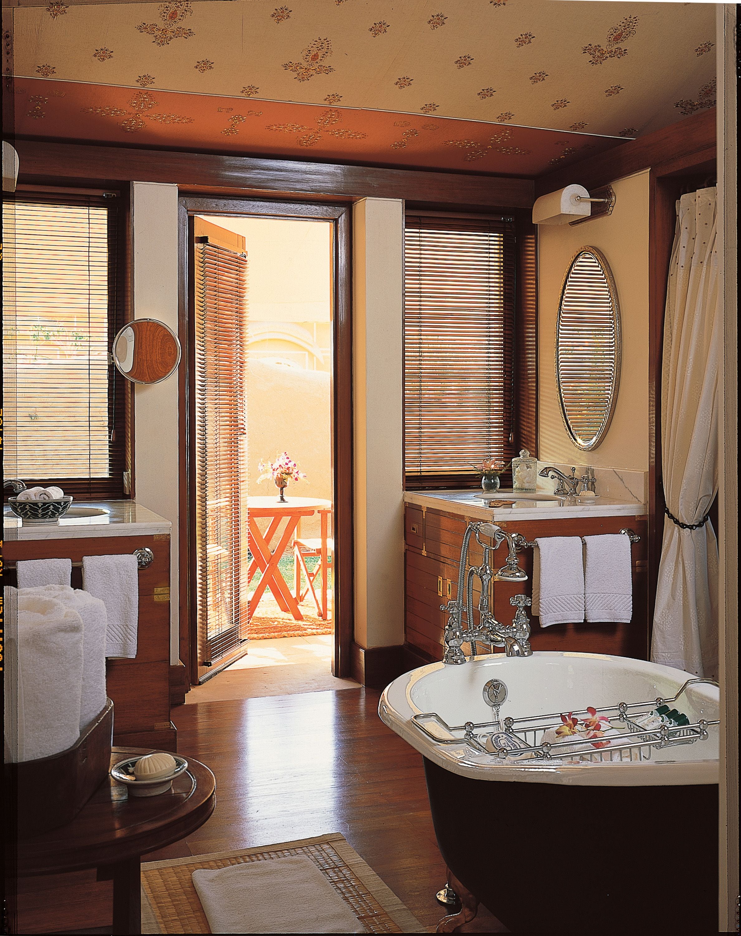 separate bathtub and shower, deep-soaking bathtub, designer toiletries