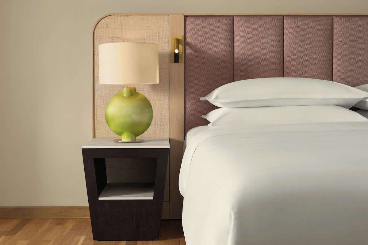 Premium bedding, memory-foam beds, minibar, in-room safe