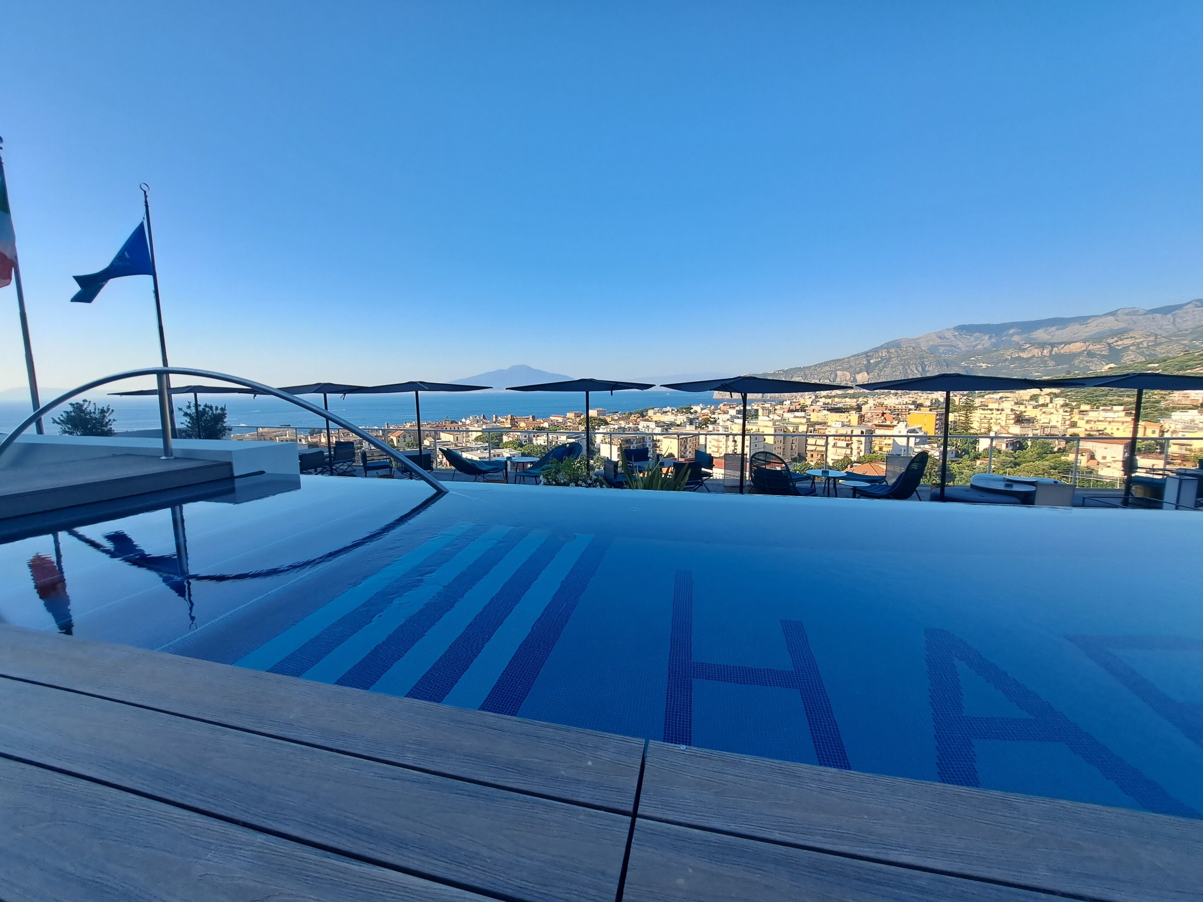 Indoor pool, seasonal outdoor pool, pool umbrellas, pool loungers