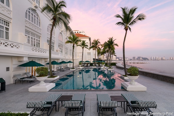 Outdoor pool, open 7:00 AM to 7:00 PM, pool umbrellas, sun loungers
