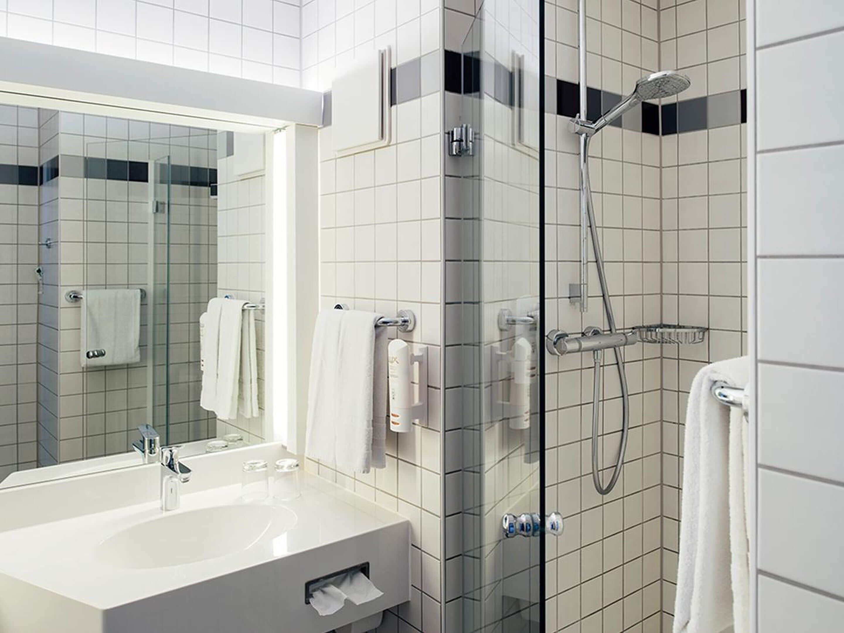 eco-friendly toiletries, hair dryer, towels