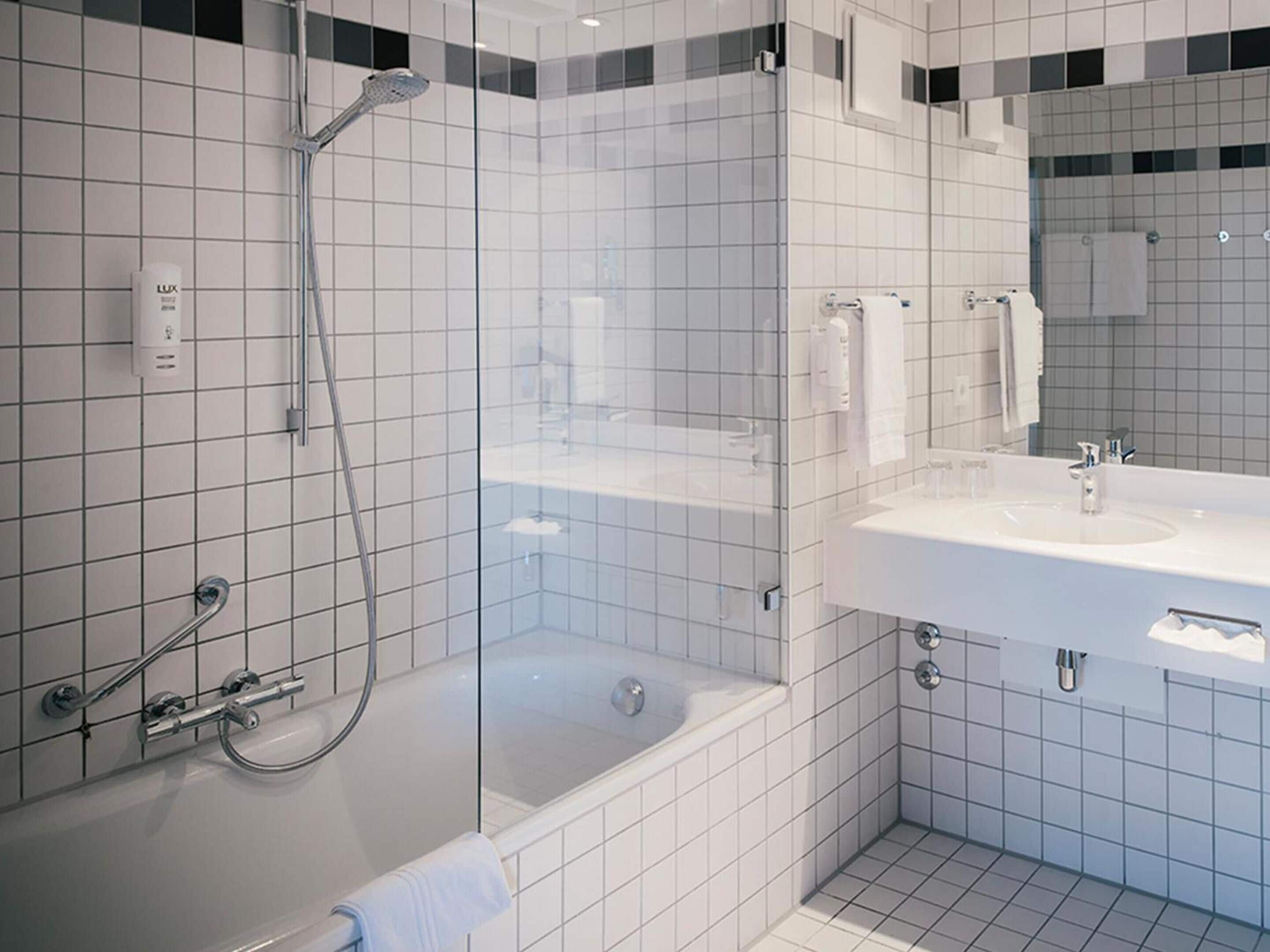 eco-friendly toiletries, hair dryer, towels