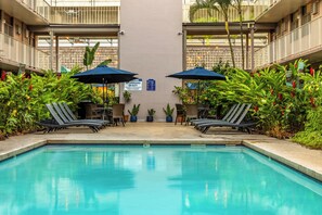 Outdoor pool, open 9:30 AM to 9:30 PM, pool umbrellas, pool loungers