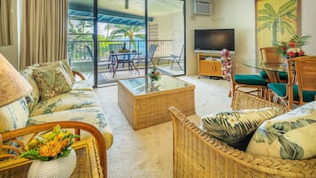 Suite, 1 Bedroom, Garden View | Living area | Flat-screen TV