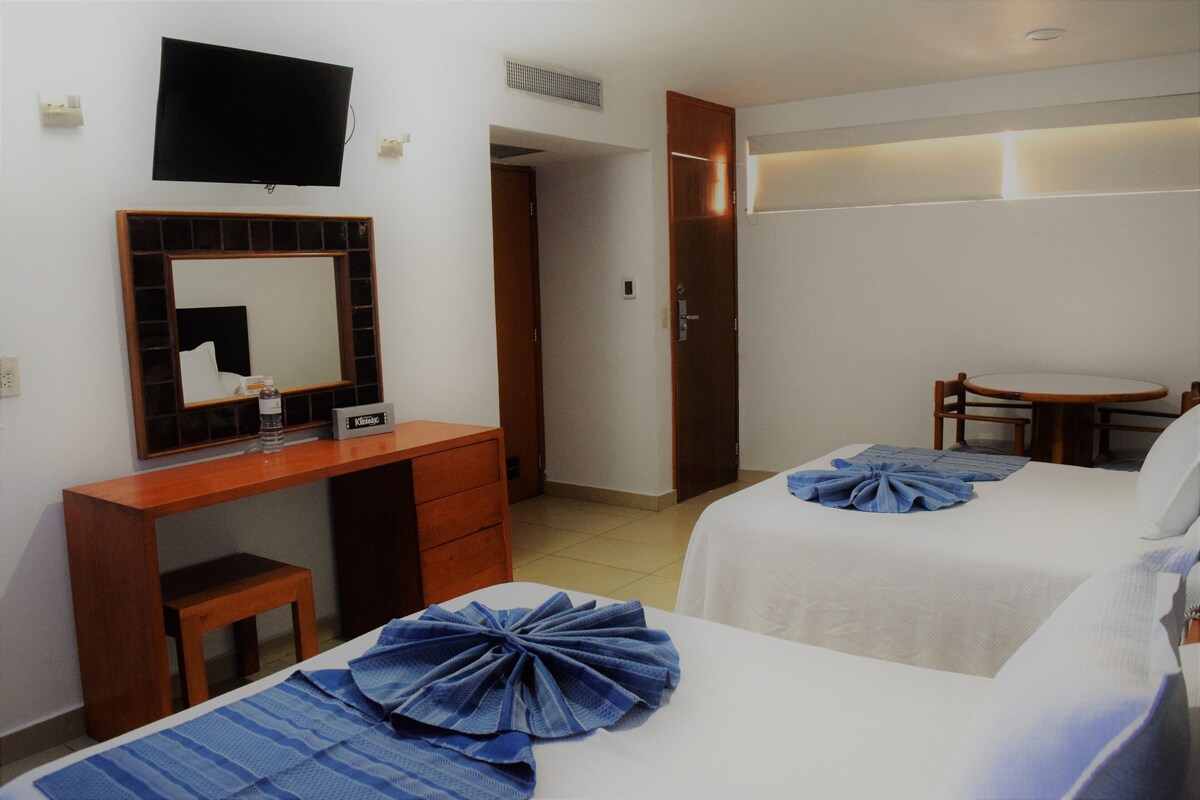 Habitación estándar, vista al jardín | Escritorio, cortinas blackout, wifi gratis y ropa de cama